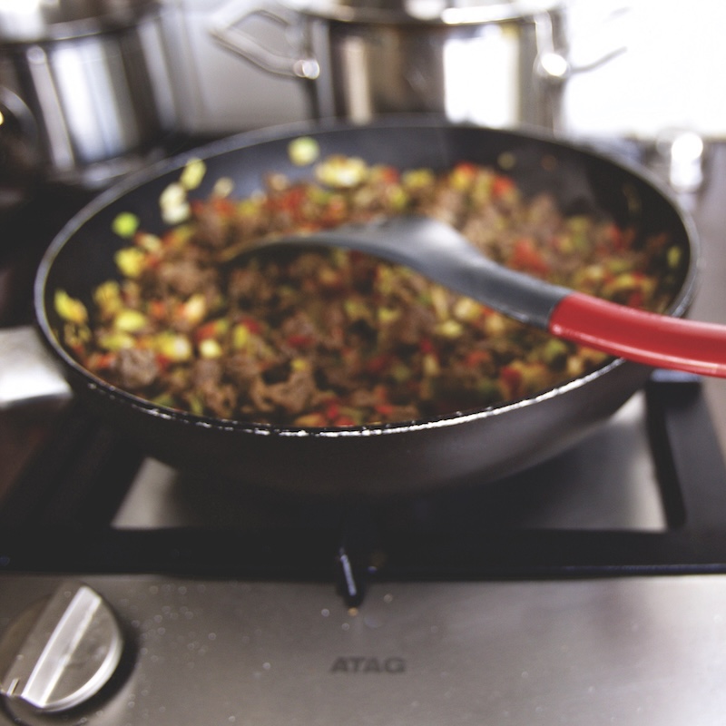 A photo of a skillet of food being cooked.